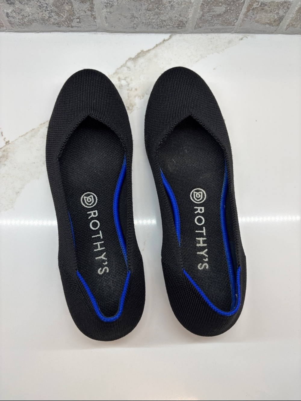 Rothy’s black rounded toe flat ballet shoes  in size 8